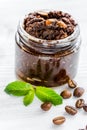 Body scrub of ground coffee on white table background Royalty Free Stock Photo