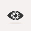 Body senses vision. Eye icon with shadow on beige background