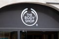 the body shop logo brand and text sign front facade chain wall entrance beauty