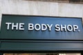 The body shop logo brand and text sign front of green entrance beauty cosmetic shop