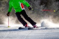 Skier on fresh groomed snow on slope
