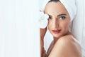 Body Skin Care. Beautiful Woman In Towel With Flower In Spa Salo Royalty Free Stock Photo