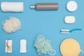 Body and skin hygienic care toiletry products, in white packaging on a blue background. Flat lay. Copy space Royalty Free Stock Photo