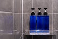Body Wash, Shampoo, and Conditioner are packed in blue bottles Royalty Free Stock Photo