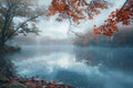 A body of water covered in mist, with trees and leaves surrounding it on a calm morning, A misty morning over a tranquil lake Royalty Free Stock Photo