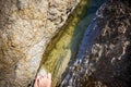 Body of water between gentle colored stones Royalty Free Stock Photo