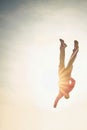 Body of an young man falling from the sky down Royalty Free Stock Photo