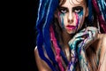 Bodyart model girl portrait with colorful paint make up. woman bright color makeup. Closeup of vogue style lady