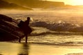 Bodyboarder going into the water