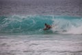 Bodyboarder riding the tube