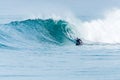 Bodyboarder surfing ocean wave