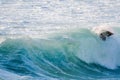 Bodyboarder surfing ocean wave