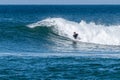 Bodyboarder surfing ocean wave