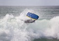 Bodyboarder on top of the wave