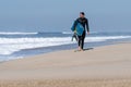 Bodyboarder walking