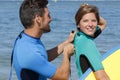 2 bodyboarders getting ready to go in te waters Royalty Free Stock Photo