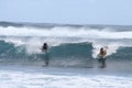 Bodyboarding - boys riding turquoise waves