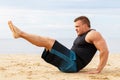 Bodybuilder on the beach Royalty Free Stock Photo