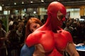 Bodybuilder during a body painting session at Milano Tattoo Convention Royalty Free Stock Photo