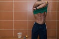 Bodybuilder In Dressing Room - Undressing His Clothing