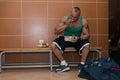 Bodybuilder Eating Healthy Diet Food Out Of Tupperware