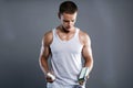 bodybuilder eating pills, steroids. Handsome Fitness Boy with medicine bottle Royalty Free Stock Photo