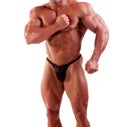 Bodybuilder flexing Royalty Free Stock Photo