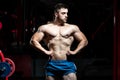 Bodybuilder Flexing Front Lat Spread Pose Royalty Free Stock Photo