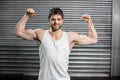 Bodybuilder man flexing his muscles Royalty Free Stock Photo
