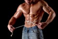 Bodybuilder man with tape measure Royalty Free Stock Photo