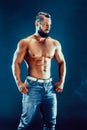 Bodybuilder posing. Beautiful sporty guy male power. Royalty Free Stock Photo