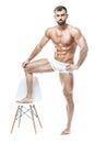 Bodybuilder posing. Beautiful sporty guy male power. Fitness mus Royalty Free Stock Photo