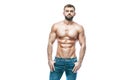 Bodybuilder posing. Beautiful sporty guy male power. Fitness muscled in blue jeans. on isolated white background. Royalty Free Stock Photo