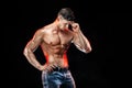 Bodybuilder posing. Beautiful sporty guy male power. Royalty Free Stock Photo