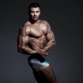 Bodybuilder posing Royalty Free Stock Photo