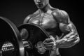 Bodybuilder prepare to do exercises with barbell Royalty Free Stock Photo