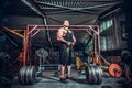 Bodybuilder preparing for deadlift of barbell Royalty Free Stock Photo