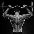 Bodybuilder showing his back Royalty Free Stock Photo