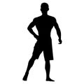 Bodybuilder standing in shorts, fitness man