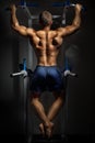 Bodybuilder training in darkness Royalty Free Stock Photo