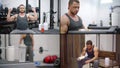 Bodybuilder is training at gym and drinking protein shake, collaged shot Royalty Free Stock Photo