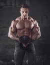 Bodybuilder with weight Royalty Free Stock Photo