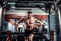 Bodybuilder Is Working On His Chest With Cable Crossover In Gym. Royalty Free Stock Photo