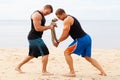 Bodybuilders on the beach