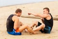 Bodybuilders on the beach
