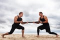 Bodybuilders on the beach