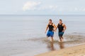 Bodybuilders on the beach