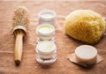 Hair brush, cream, sponge, soap bar and bath towel Royalty Free Stock Photo