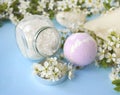 Bodycare cosmetic composition with spa ball, sea salt and spring blossom.