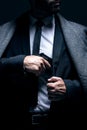 Bodyguard, hands or gun in suit jacket on studio background in dark secret spy or isolated mafia leadership. Gangster Royalty Free Stock Photo